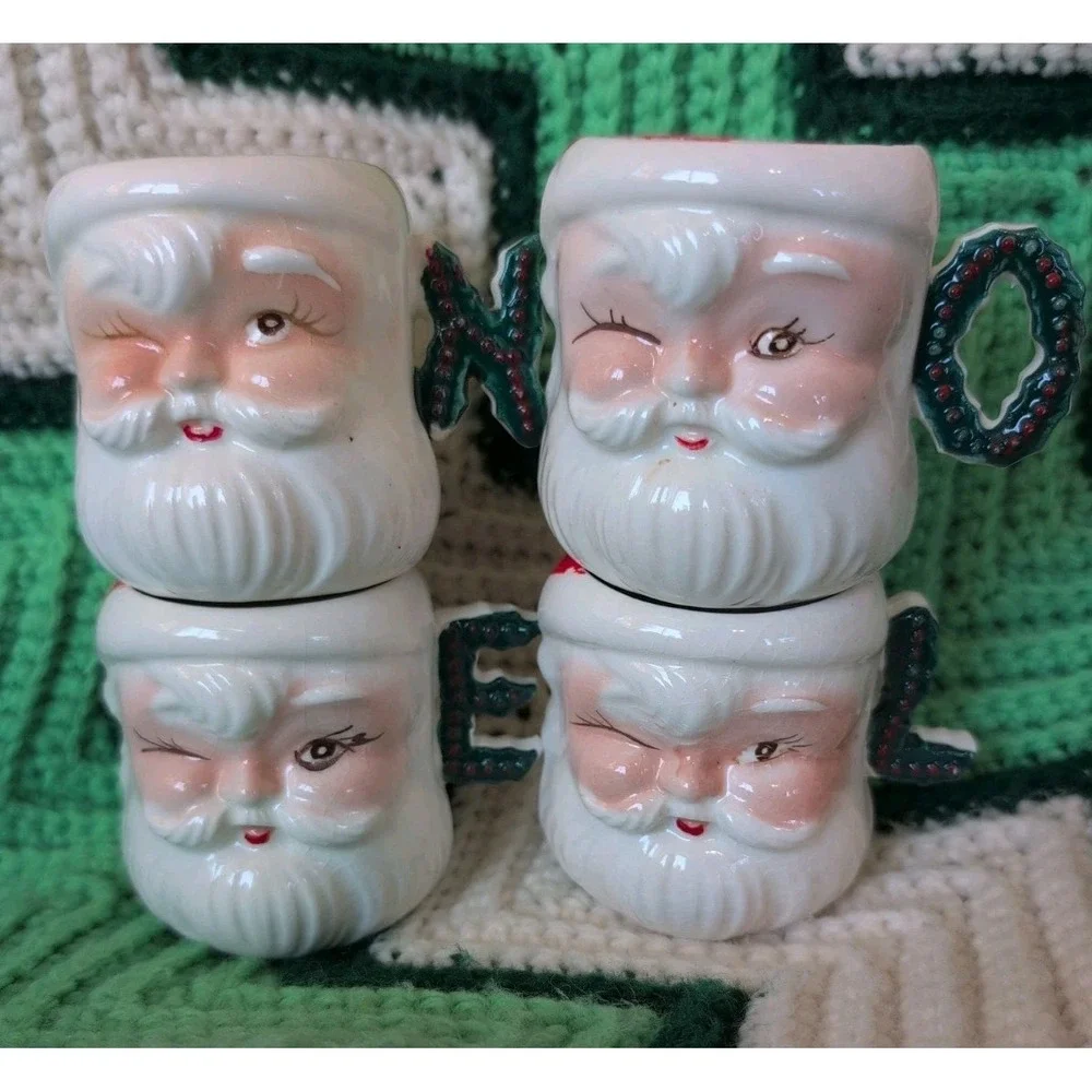 RARE Vtg Set of 4 Japan Commodore Winking Santa Mugs that handles spell 